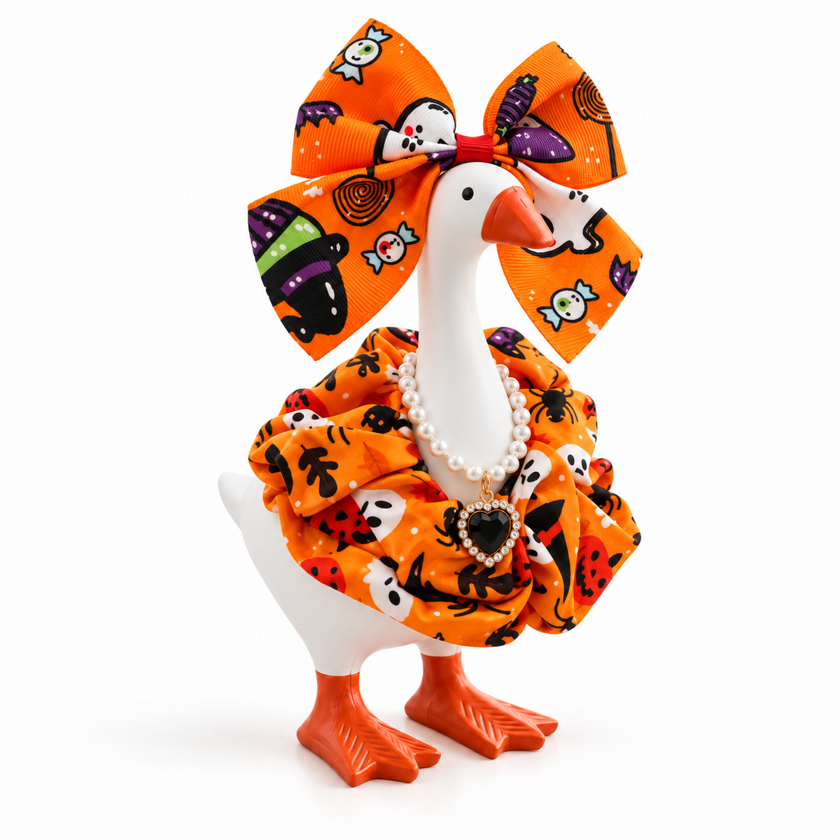 Orange Halloween bow, ruffled collar and pearl necklace outfit on a 7-inch Little Honk Desk Goose